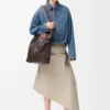 Giacca drappeggiata in denim blu indaco