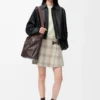 Giacca drappeggiata in pelle di agnello nappa Nero