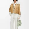 Giacca in shearling bianco/oro Giacca in shearling bianco/oro