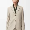 Giacca sartoriale in lana melange beige chiaro Giacca sartoriale in lana melange beige chiaro