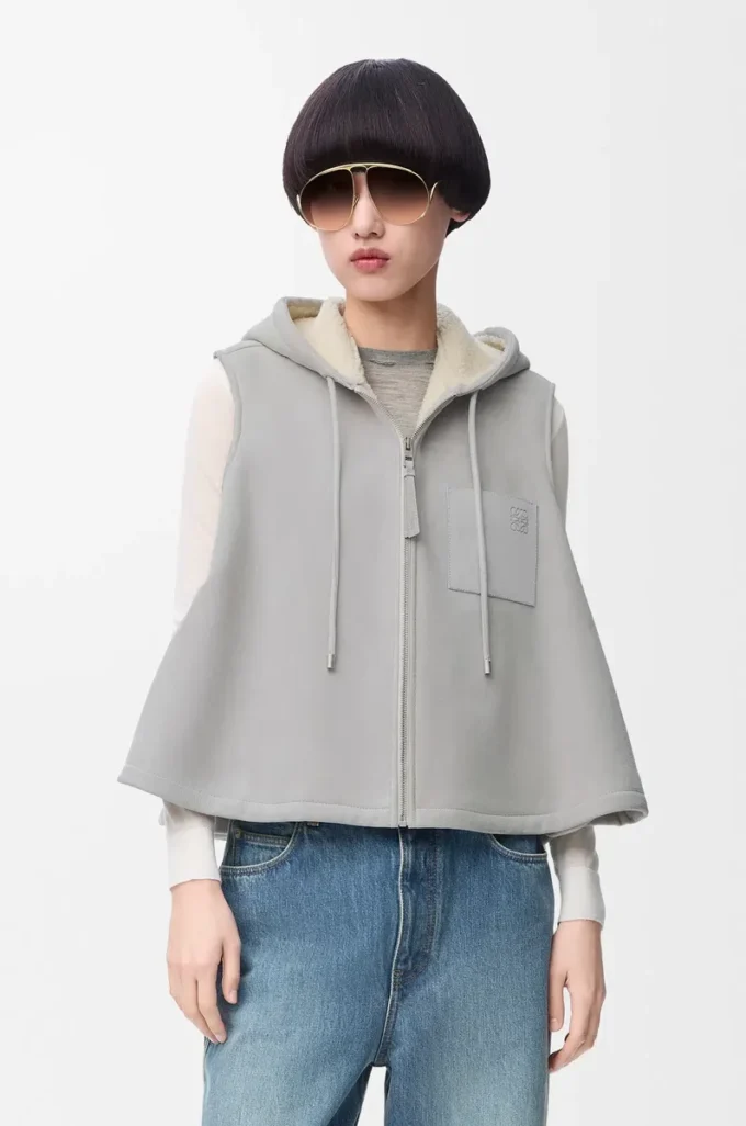 Gilet con cappuccio in shearling grigio melange chiaro