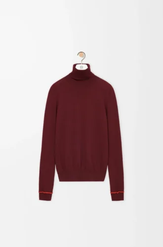 Maglione in lana bordeaux/arancione