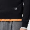 Maglione in lana nero/grigio Maglione in lana nero/grigio
