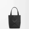 Mini borsa Puzzle Fold in pelle di vitello lucida nera Mini borsa Puzzle Fold in pelle di vitello lucida nera