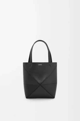 Mini borsa Puzzle Fold in pelle di vitello lucida nera