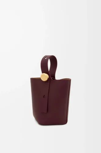 Mini Pebble a secchiello in morbida pelle di vitello Dark Burgundy