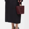 Mini Pebble a secchiello in morbida pelle di vitello Dark Burgundy