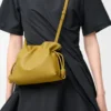 Mini pochette Flamenco in pelle di vitello nappa Ginger