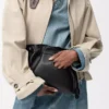 Panta medium Pochette Flamenco in pelle di vitello lucida Nero