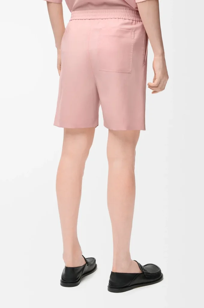 Pantaloncini in lana color corallo