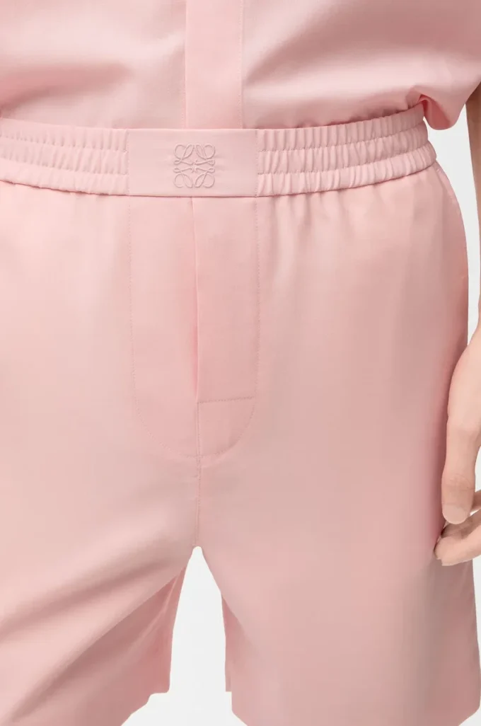 Pantaloncini in lana color corallo