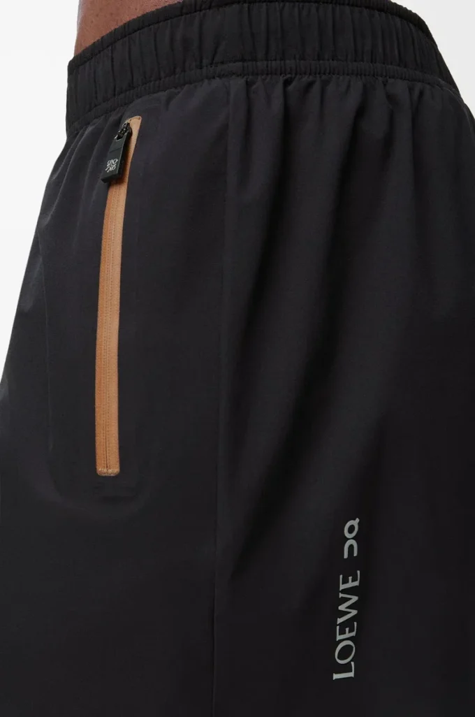 Pantaloncini tecnici in tessuto tecnico nero Pantaloncini tecnici in tessuto tecnico nero