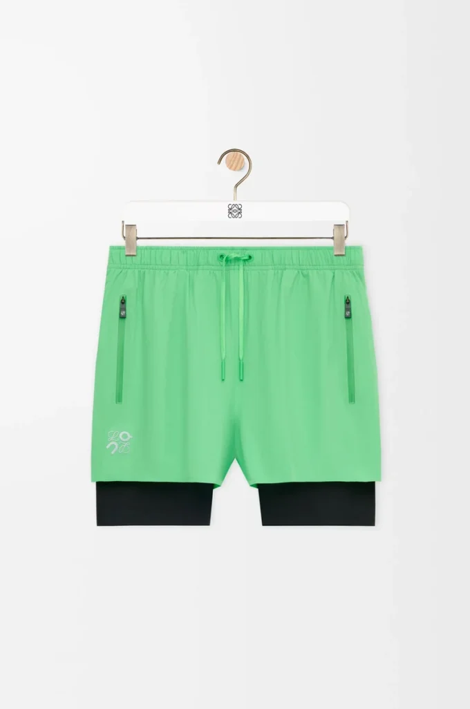 Pantaloncini tecnici in tessuto tecnico verde Pantaloncini tecnici in tessuto tecnico verde