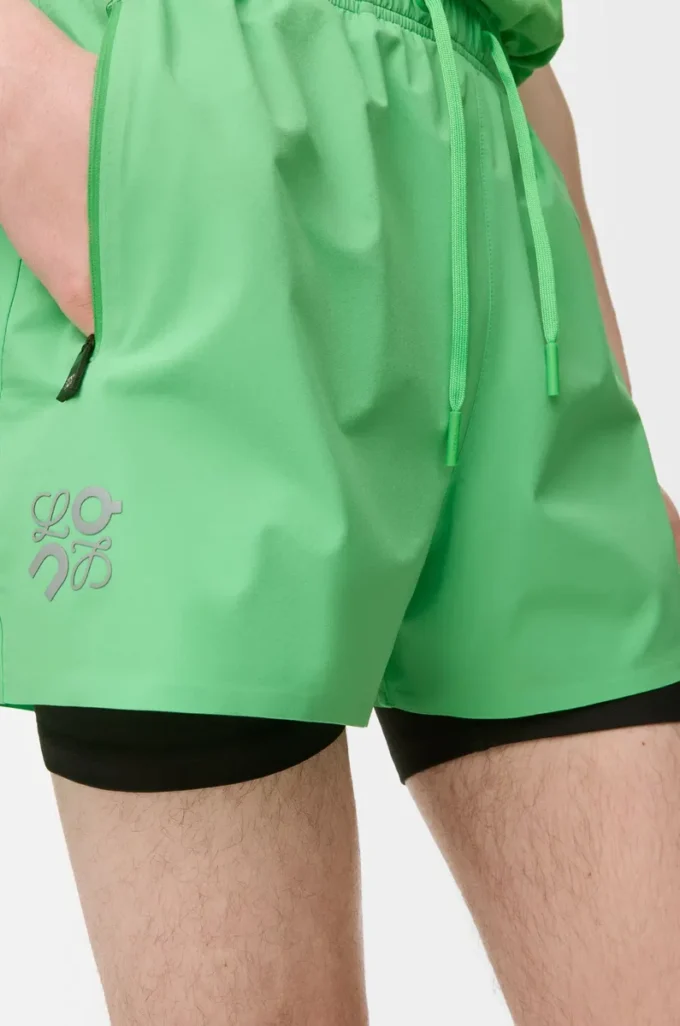 Pantaloncini tecnici in tessuto tecnico verde Pantaloncini tecnici in tessuto tecnico verde
