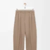 Pantaloni a barilotto in lana color sabbia Pantaloni a barilotto in lana color sabbia