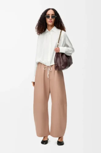 Pantaloni a zampa in pelle di agnello nappa Beige