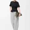 Pantaloni a zampa in pelle scamosciata di capra grigio chiaro Pantaloni a zampa in pelle scamosciata di capra grigio chiaro