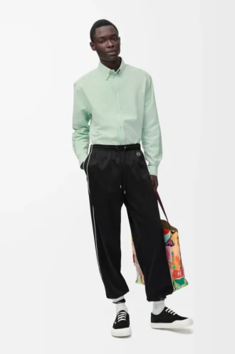 Pantaloni da tuta in jersey tecnico nero Pantaloni da tuta in jersey tecnico nero