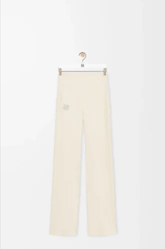 Pantaloni morbidi a zampa in jersey tecnico avorio Pantaloni morbidi a zampa in jersey tecnico avorio