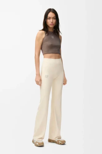 Pantaloni morbidi a zampa in jersey tecnico avorio Pantaloni morbidi a zampa in jersey tecnico avorio