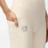 Pantaloni morbidi a zampa in jersey tecnico avorio