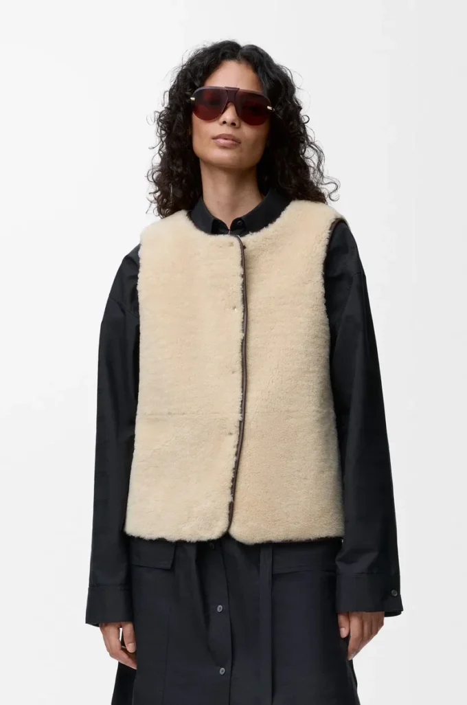 Piumino in shearling e misto cotone Nero Piumino in shearling e misto cotone Nero