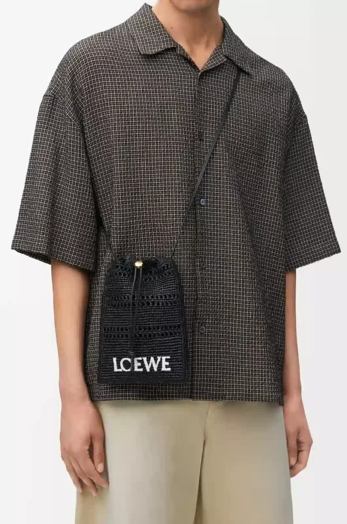 Pochette con coulisse in rafia Nero