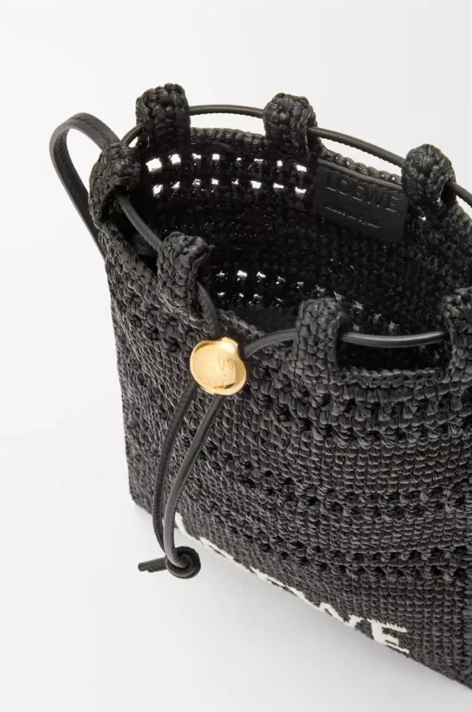 Pochette con coulisse in rafia Nero