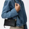 Pochette Joya in pelle di vitello nappa nera