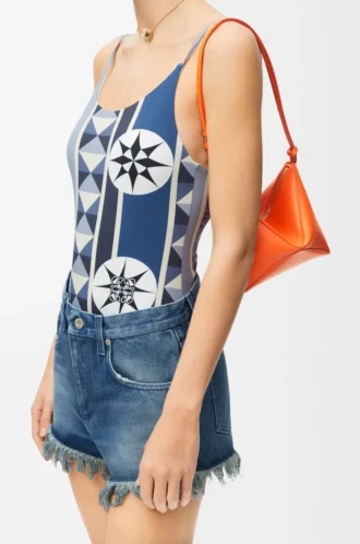 Pochette Puzzle Fold in pelle di vitello nappa lucida Vivid Orange