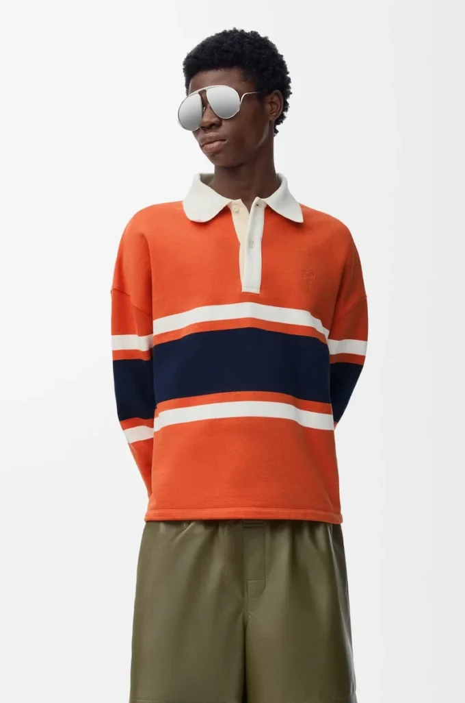Polo a maniche lunghe in cotone Arancione/Blu navy Polo a maniche lunghe in cotone Arancione/Blu navy