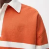 Polo a maniche lunghe in cotone Arancione/Blu navy Polo a maniche lunghe in cotone Arancione/Blu navy