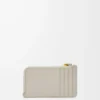 Portacarte e portamonete con nodo in pelle di vitello nappa lucida Shell Grey/Dandelion Portacarte e portamonete con nodo in pelle di vitello nappa lucida Shell Grey/Dandelion