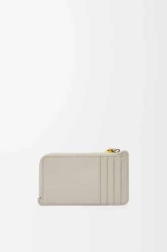 Portacarte e portamonete con nodo in pelle di vitello nappa lucida Shell Grey/Dandelion