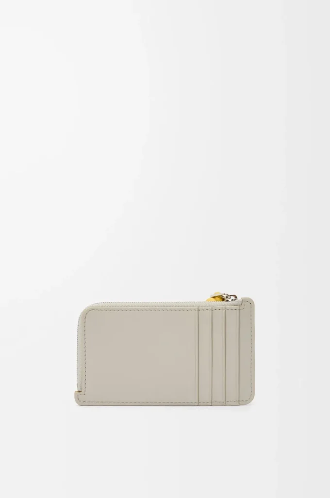 Portacarte e portamonete con nodo in pelle di vitello nappa lucida Shell Grey/Dandelion Portacarte e portamonete con nodo in pelle di vitello nappa lucida Shell Grey/Dandelion