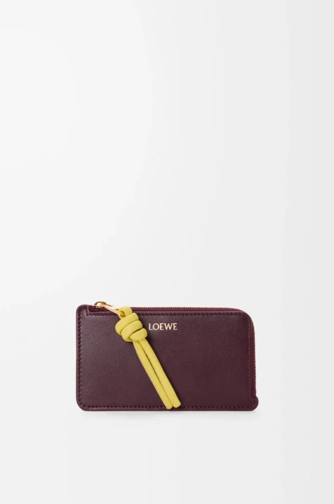 Portacarte e portamonete Knot in pelle di vitello nappa lucida Dark Burgundy/Light Citrine