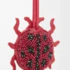 Portachiavi a forma di coccinella in pelle con perline rosso rubino