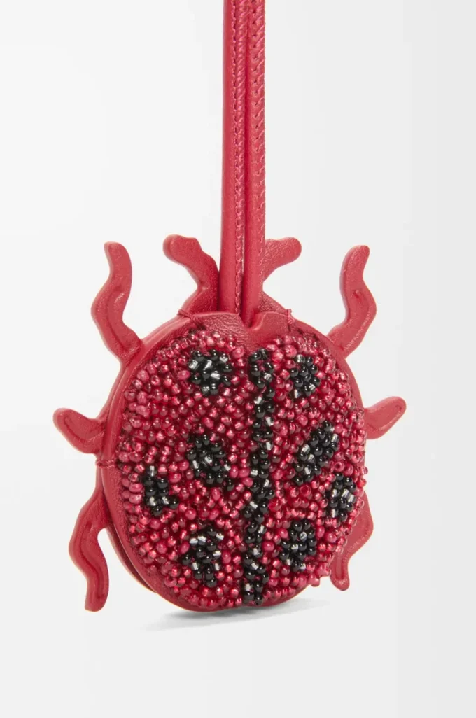 Portachiavi a forma di coccinella in pelle con perline rosso rubino