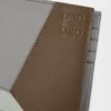 Portafoglio bifold Puzzle in classica pelle di vitello marrone invernale/grigio cenere