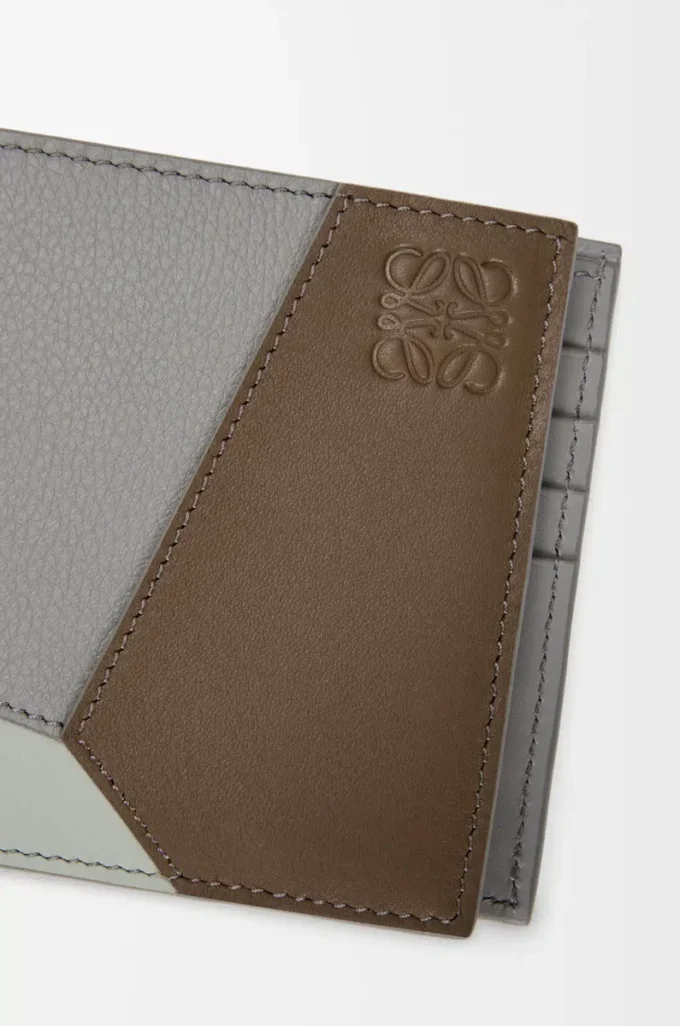 Portafoglio bifold Puzzle in classica pelle di vitello marrone invernale/grigio cenere