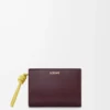 Portafoglio compatto con nodo in pelle di vitello nappa lucida Dark Burgundy/Light Citrine