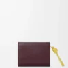 Portafoglio compatto con nodo in pelle di vitello nappa lucida Dark Burgundy/Light Citrine