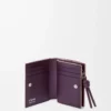 Portafoglio compatto Knot in pelle di vitello nappa lucida Clay/Plum