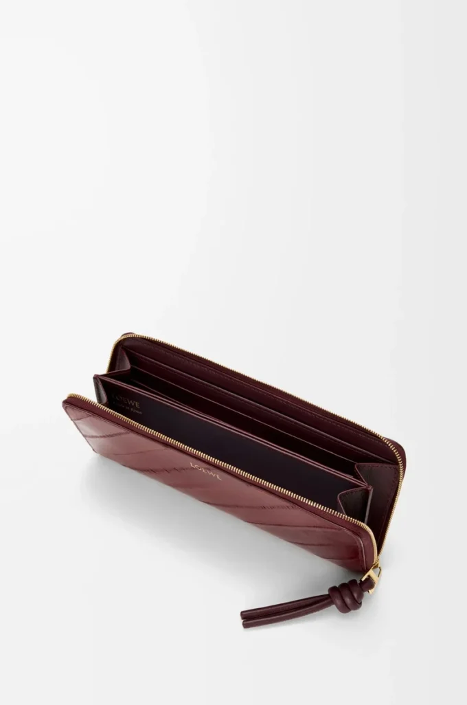 Portafoglio slim con zip e nodo in pelle di anguilla Dark Burgundy Portafoglio slim con zip e nodo in pelle di anguilla Dark Burgundy