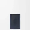 Portafoglio verticale piccolo Puffer Anagram in pelle di vitello nappa lucida blu navy intenso