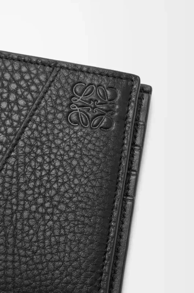 Portamonete bifold Puzzle in morbida pelle di vitello martellata Nero Portamonete bifold Puzzle in morbida pelle di vitello martellata Nero