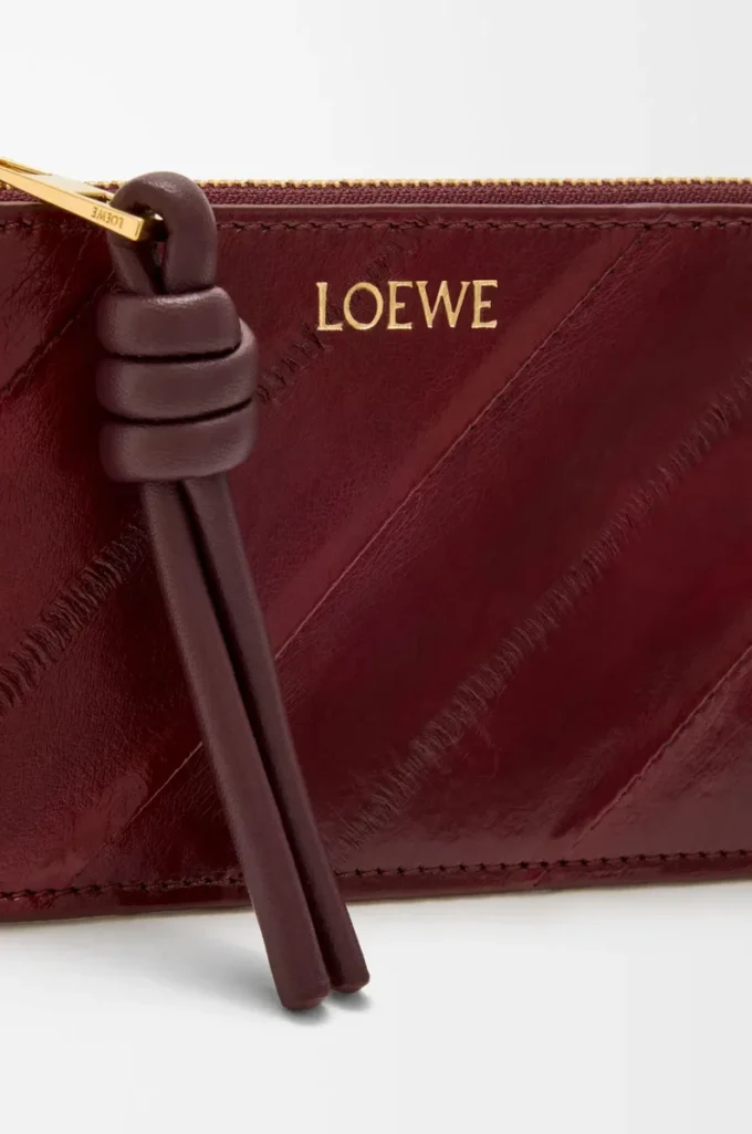 Portamonete con nodo in pelle di anguilla Dark Burgundy