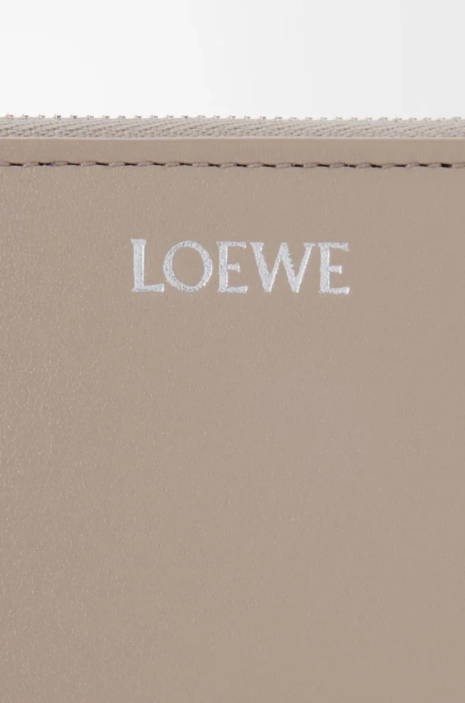 Portamonete con zip in pelle di vitello nappa lucida Clay/Plum
