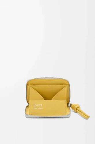 Portamonete con zip in pelle di vitello nappa lucida grigio conchiglia/dente di leone