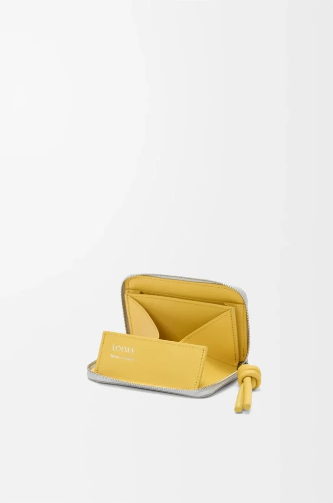 Portamonete con zip in pelle di vitello nappa lucida grigio conchiglia/dente di leone